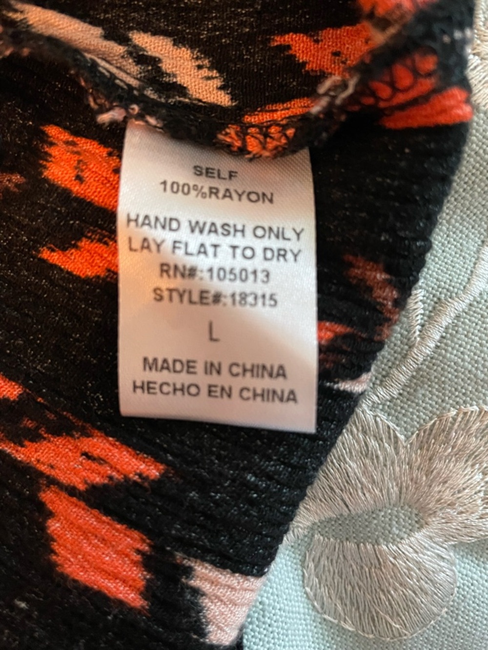 Savanna Jane Black Top with Bright Orange and Soft Pink Floral & Chevron Detail - Picture 10 of 10